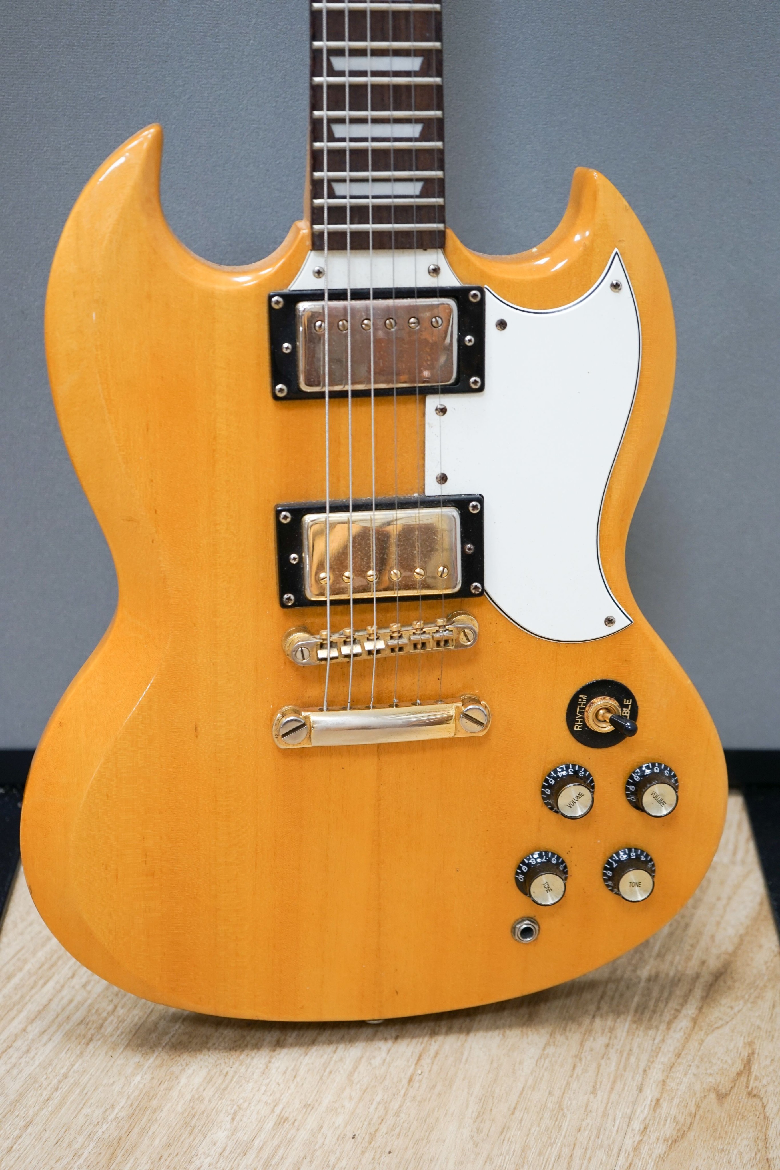 An Epiphone SG guitar, serial no. UOO111768